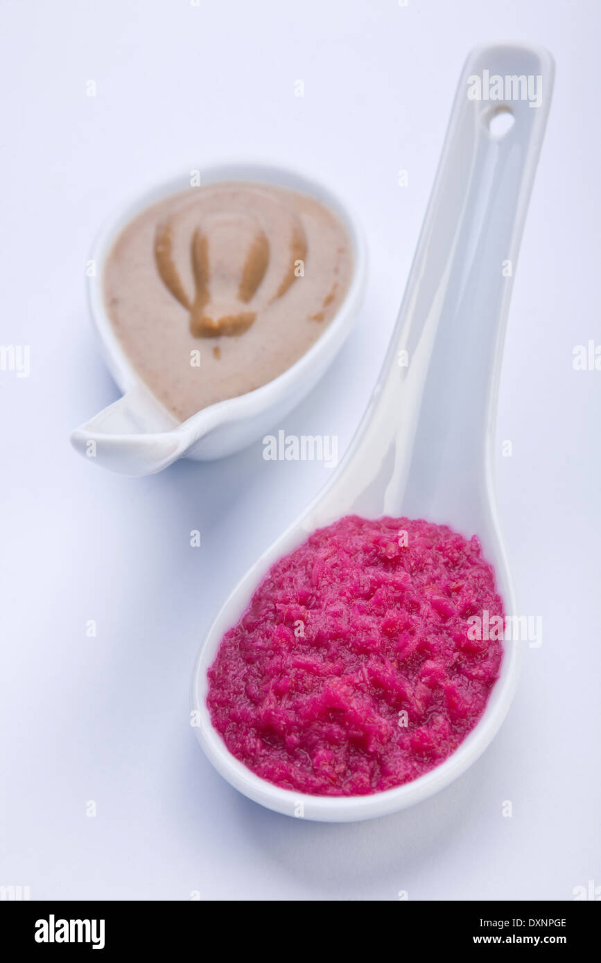 Horse radish sauce and mustard in ceramic spoon Stock Photo