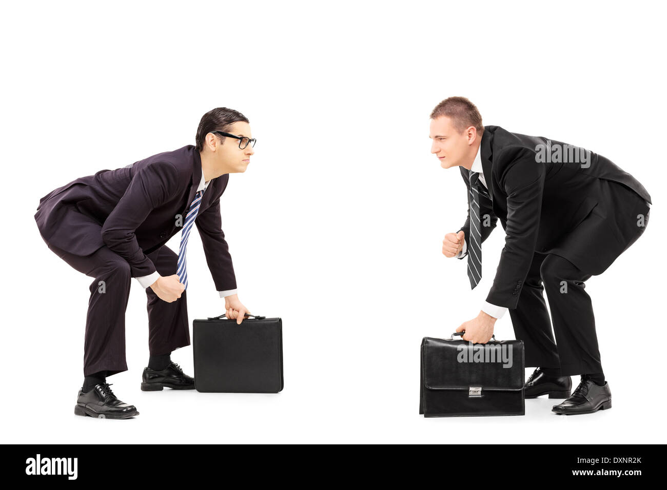 Two businessmen standing in sumo wrestling stance Stock Photo