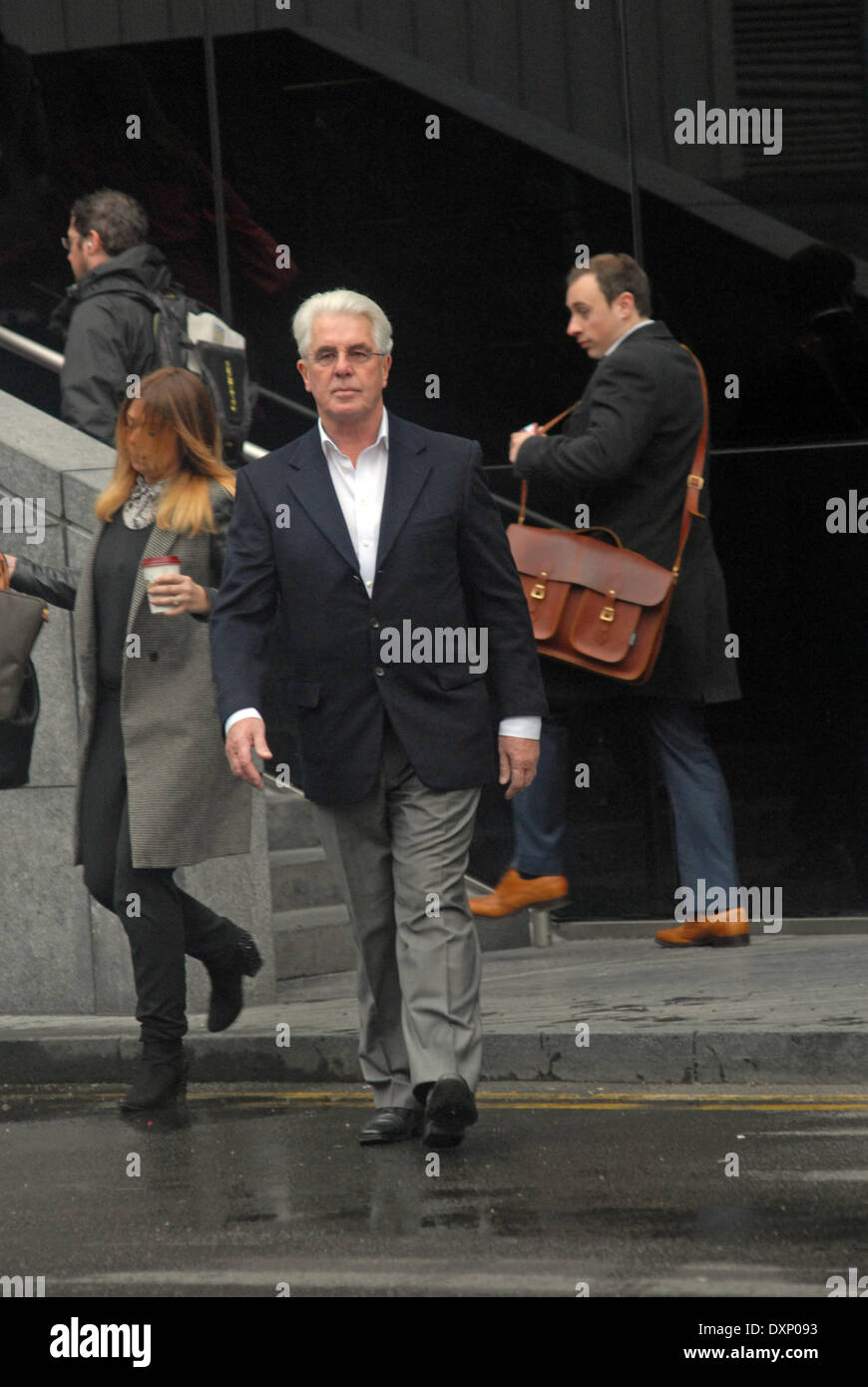 28 March 2014 Max Clifford arrives at Southwark Crown Court to continue giving evidence in his defence on 11 charges of indecent assault Stock Photo