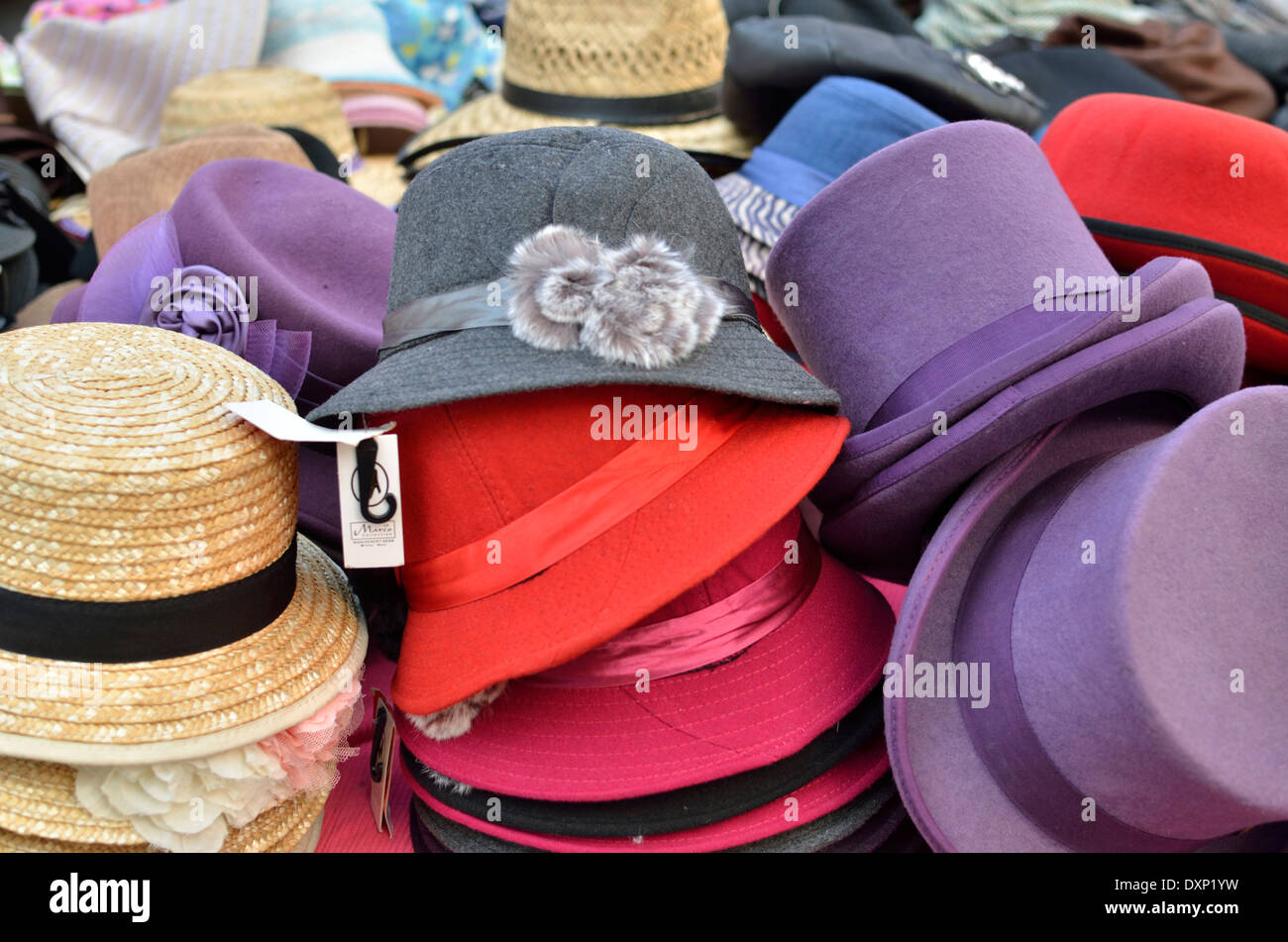 Smart high class men's and women's hats on display on a market stall,  Portobello Road, Notting Hill, London, UK Stock Photo - Alamy