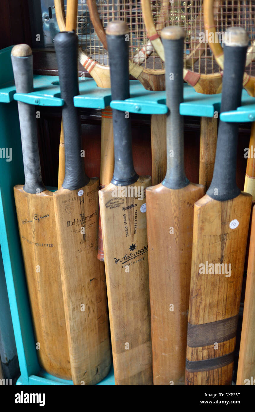 Old cricket bats in an antique shop, Portobello Road, Notting Hill