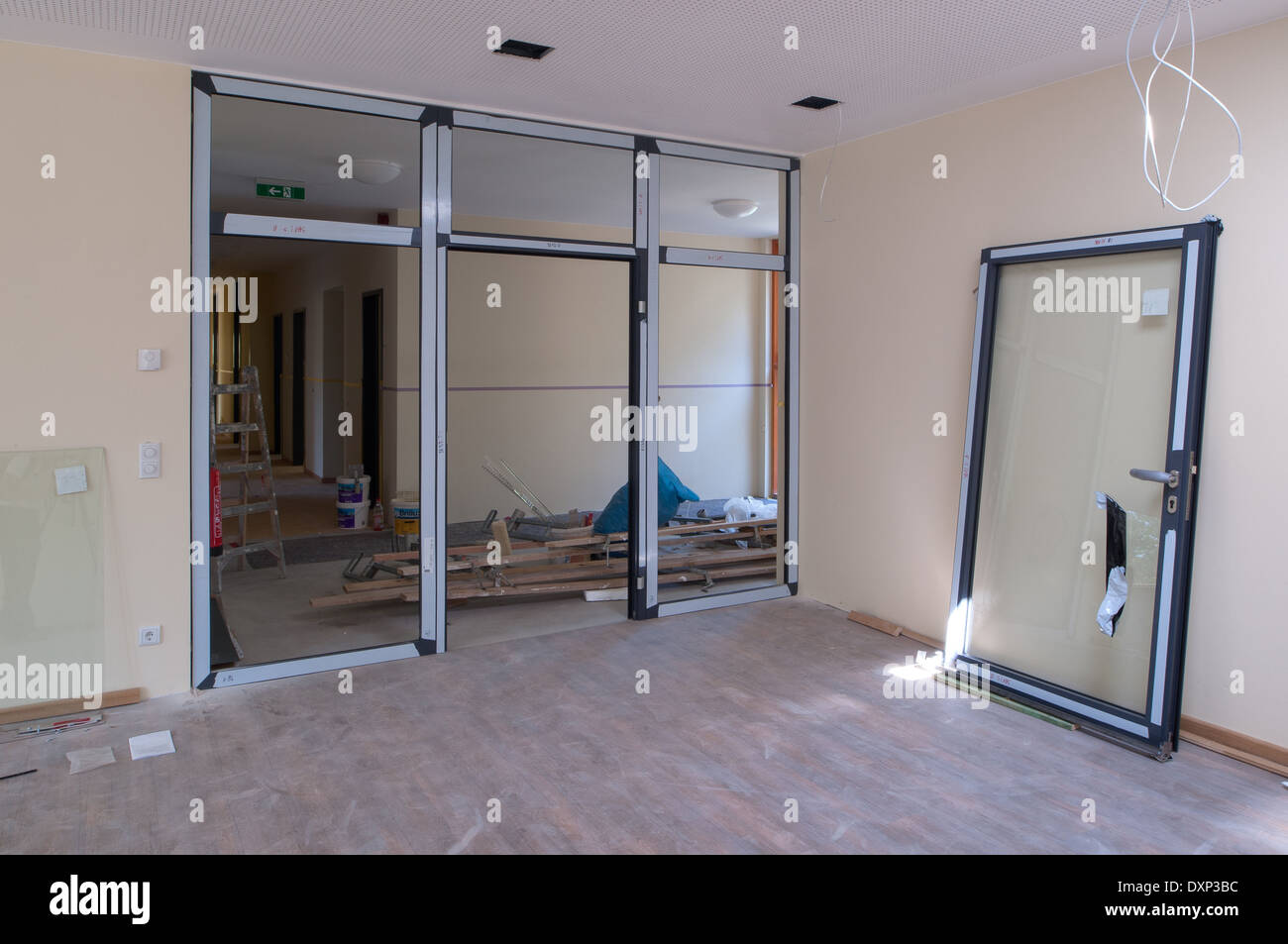 Berlin, Germany, installation of glass doors at a construction site Stock  Photo - Alamy