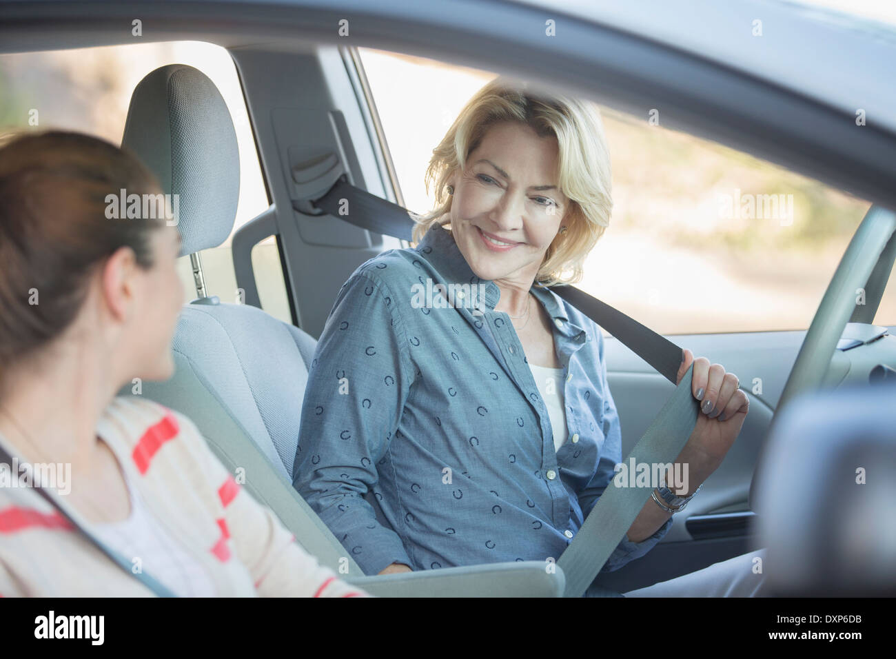 Mother and daughter inside car Stock Photo