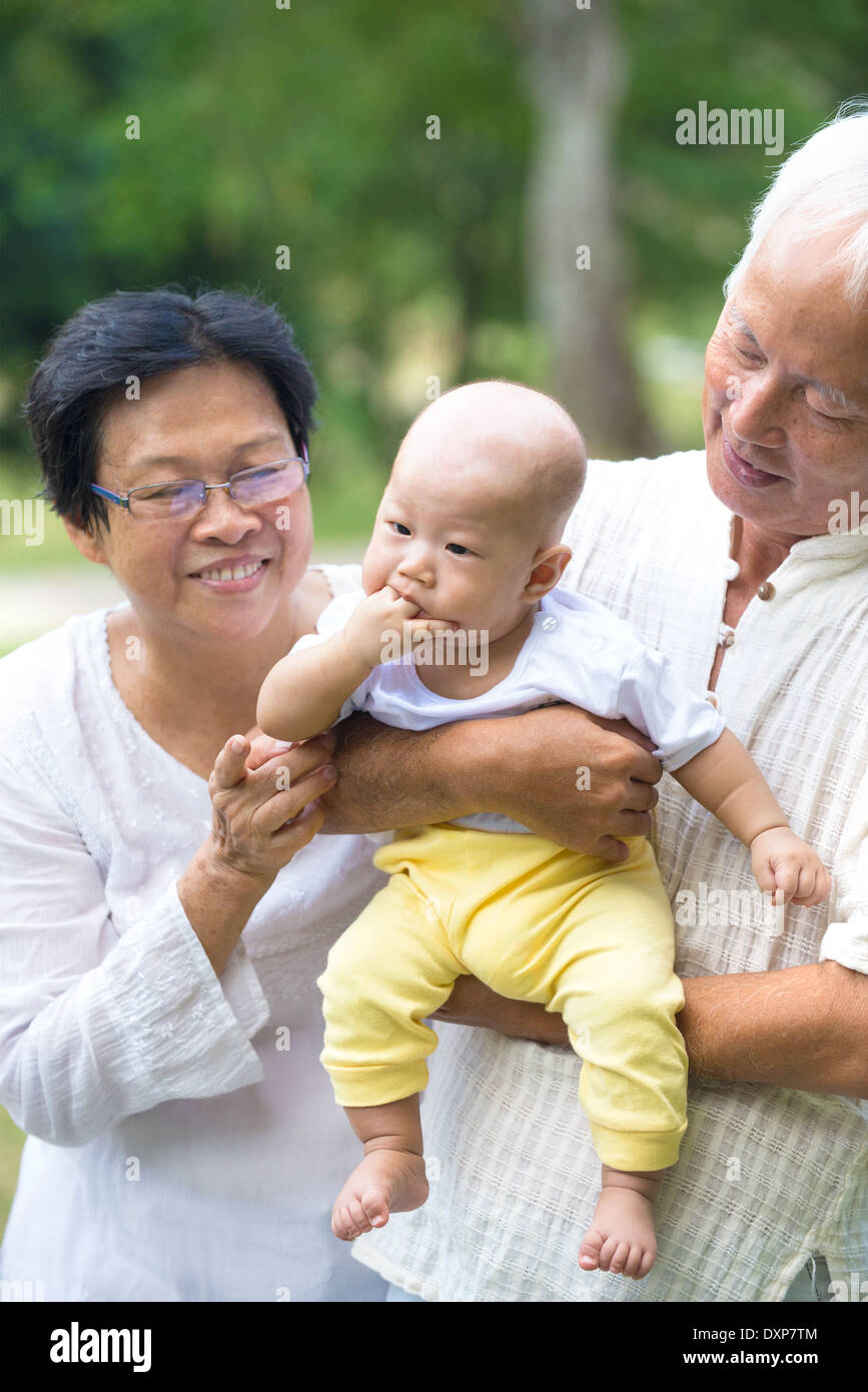 Baby licking hand hires stock photography and images Alamy