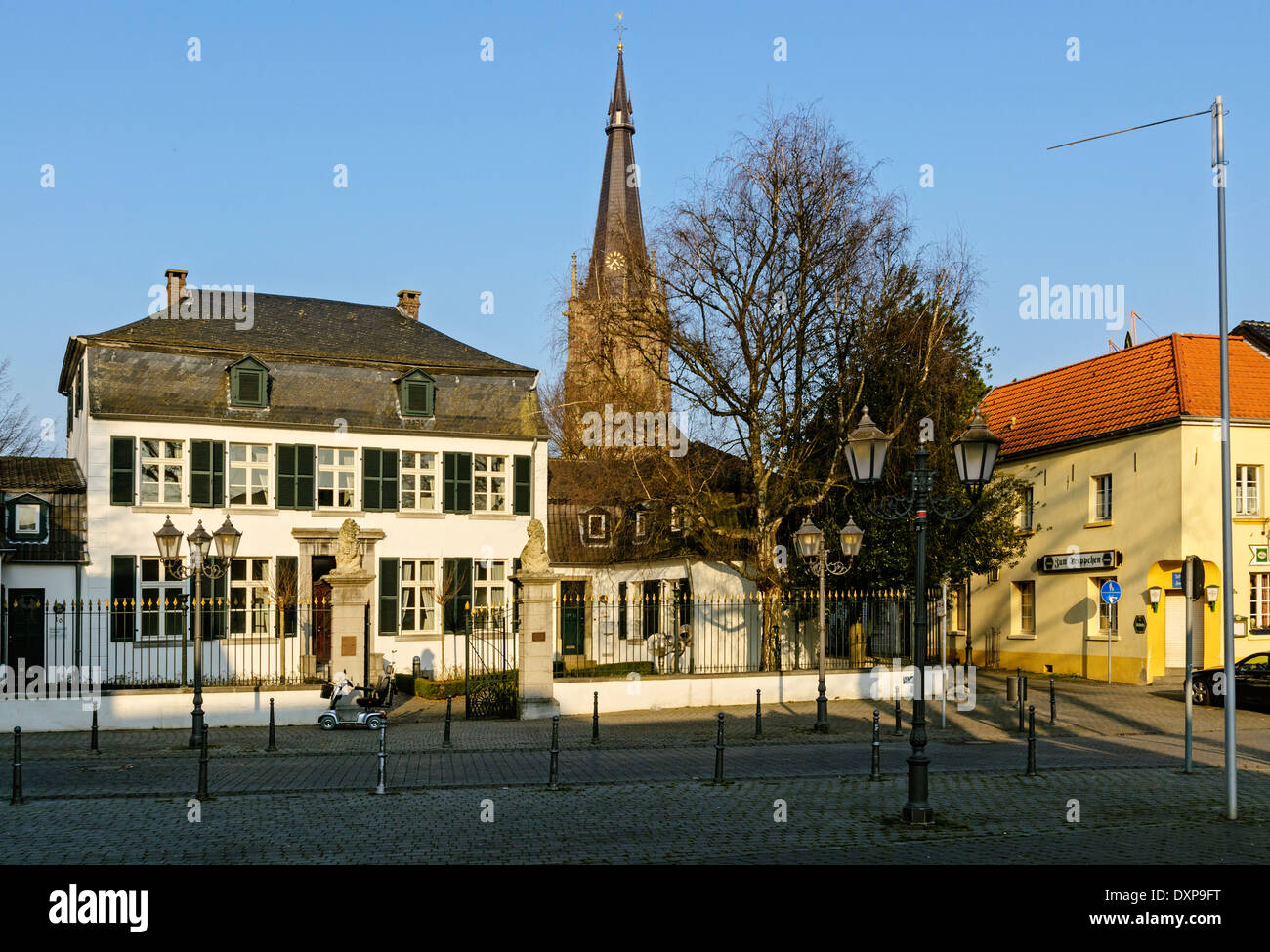 Erkelenz, Haus Spiess and spire of  St. Lambertus Church, NRW, Germany. Stock Photo