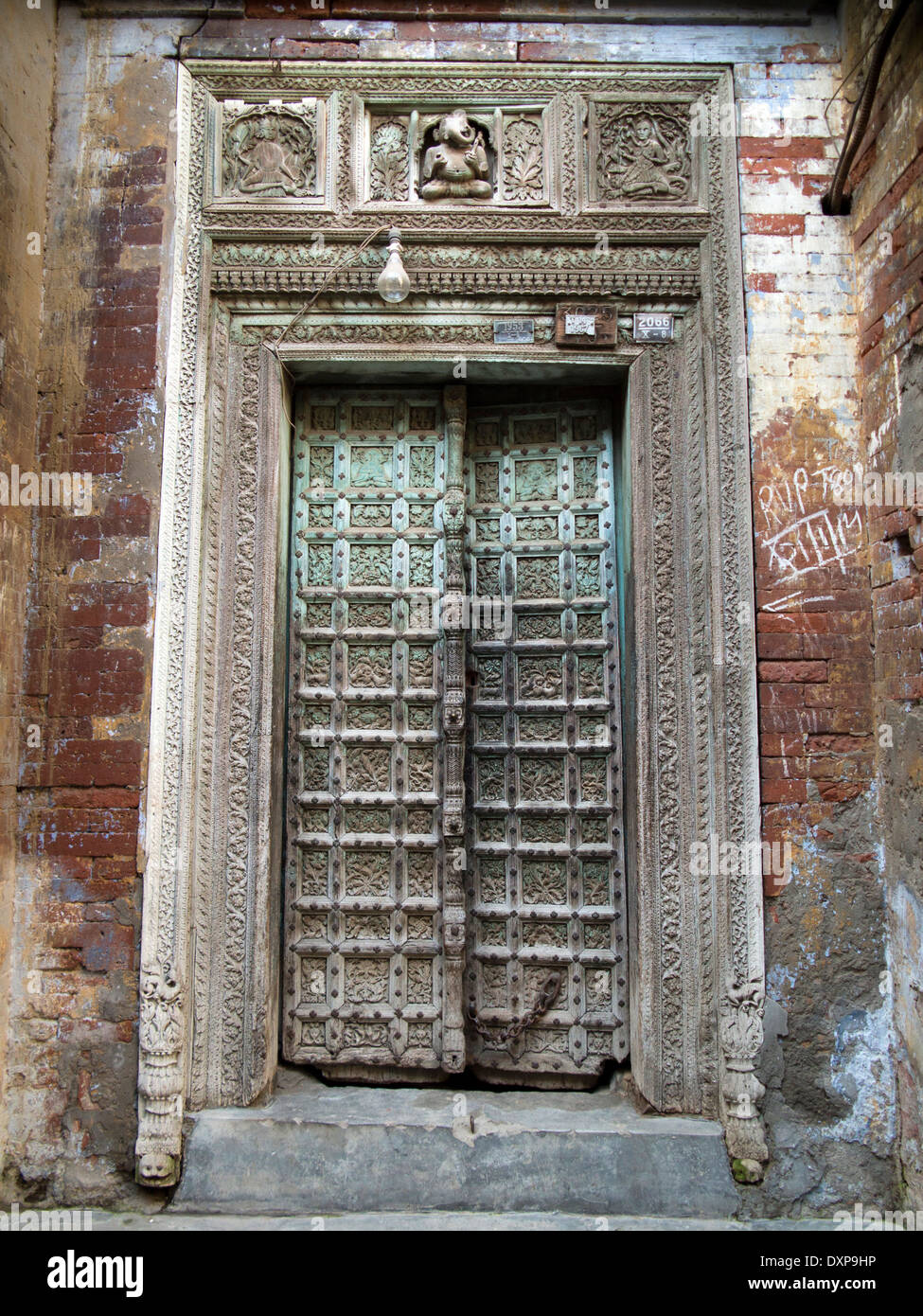 India, Punjab, Amritsar, Taksal Chowk, decorative old doorway in old town bazaar Stock Photo