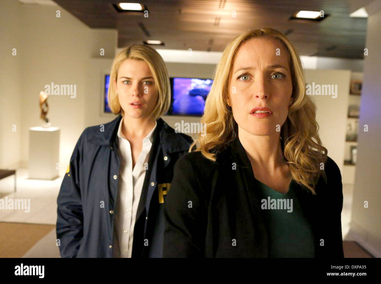 CRISIS 2013 NBCUniversal Media film with Gillian Anderson at right and Rachael Taylor Stock Photo