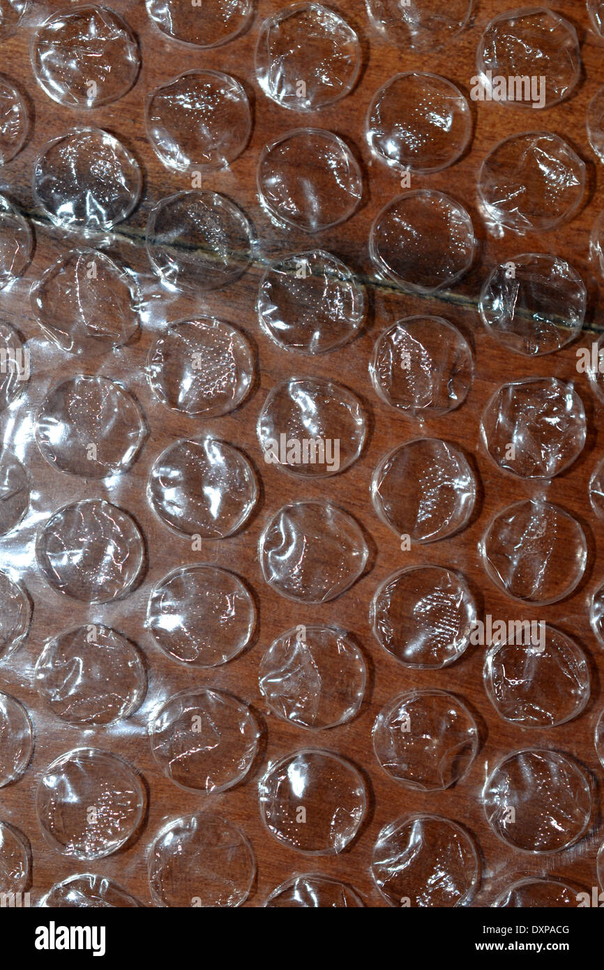 https://c8.alamy.com/comp/DXPACG/bubble-wrap-bubble-pack-or-bubble-paper-is-a-pliable-transparent-plastic-DXPACG.jpg