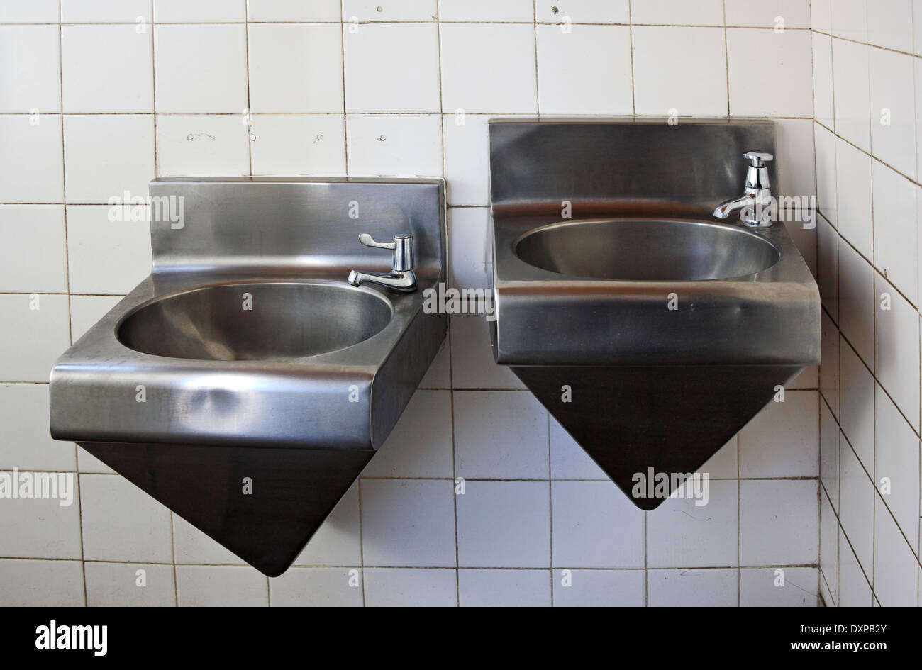 Washing facilities in a public convenience in the Norfolk Broads at Reedham, Norfolk, England, United Kingdom. Stock Photo