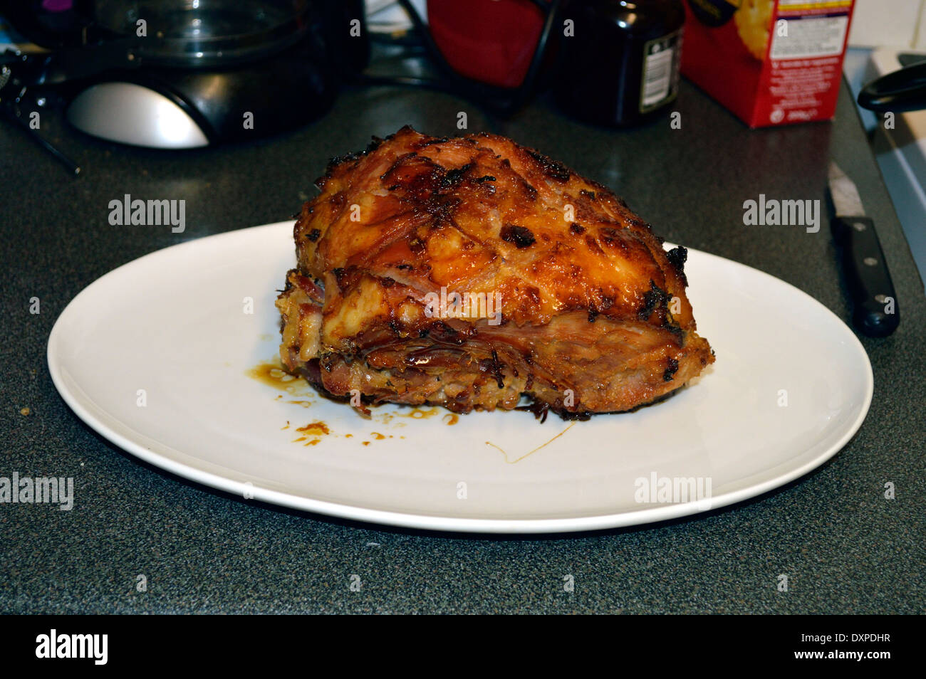 Honey roast gammon joint Stock Photo Alamy