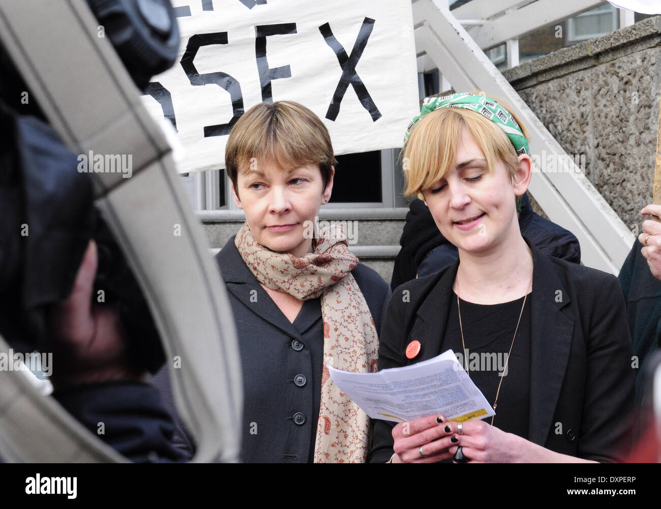 Brighton, East Sussex, UK..28 March  2014..Caroline Lucas MP outside Brighton Court  with co defendants after day 5 of their trial charged with obstructing the highway and a public order offence at Balcome where Cuadrilla was test drilling in August. The case has been adjourned to 17 April. Ms Lucas joined co defendants and supporters outside the court where Sheila Menon, also charged, read a statement  about Fracking and Ms Lucas thanked her supporters.. David Burr/Alamy Live News Stock Photo