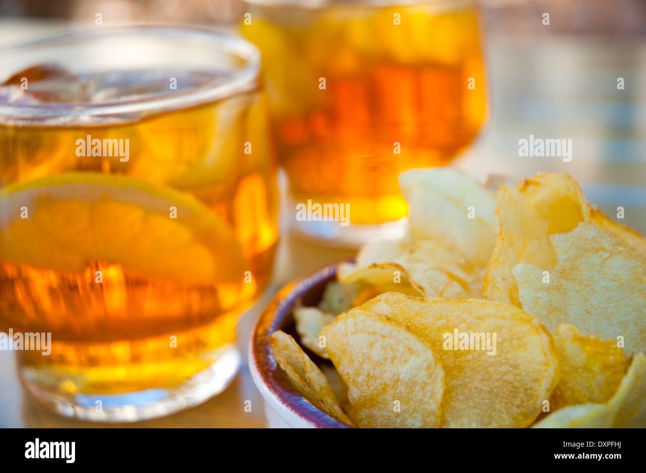 Chips and soft drinks. Close view Stock Photo Alamy