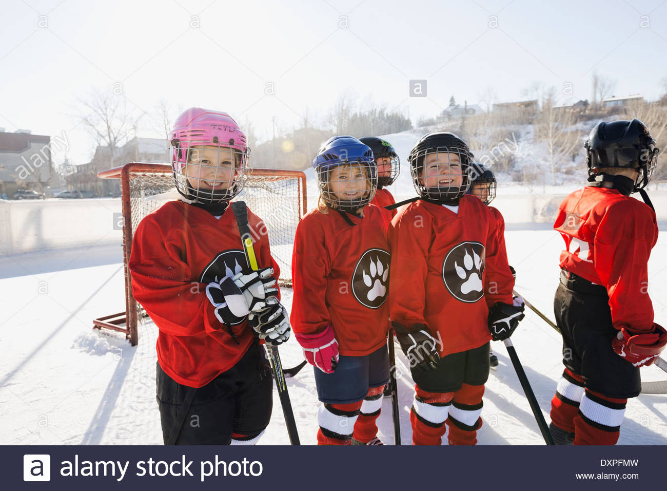 Portrait of smiling ice hockey players on rink Stock Photo Alamy