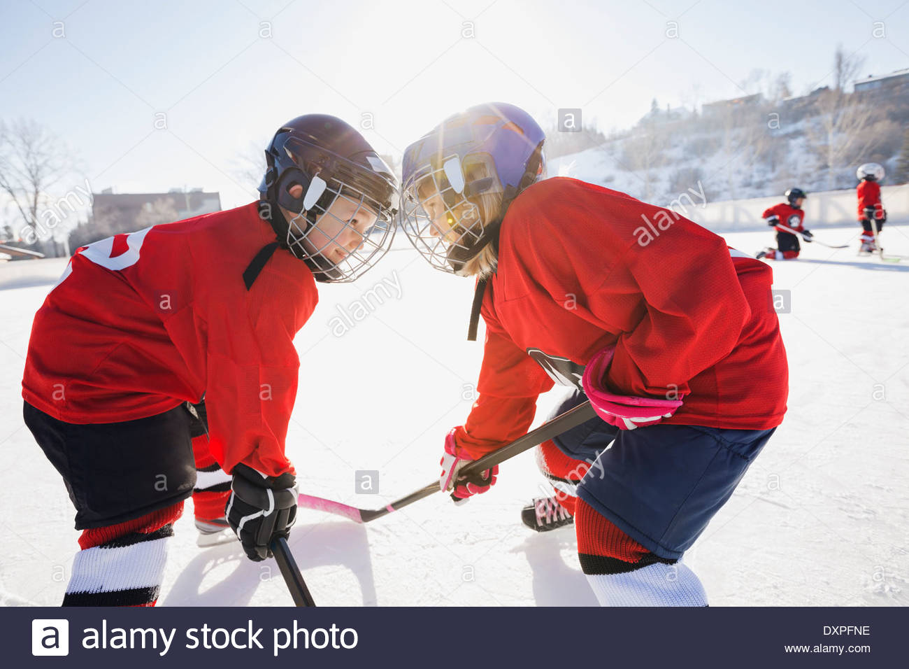 Two girls playing hockey hires stock photography and images Alamy