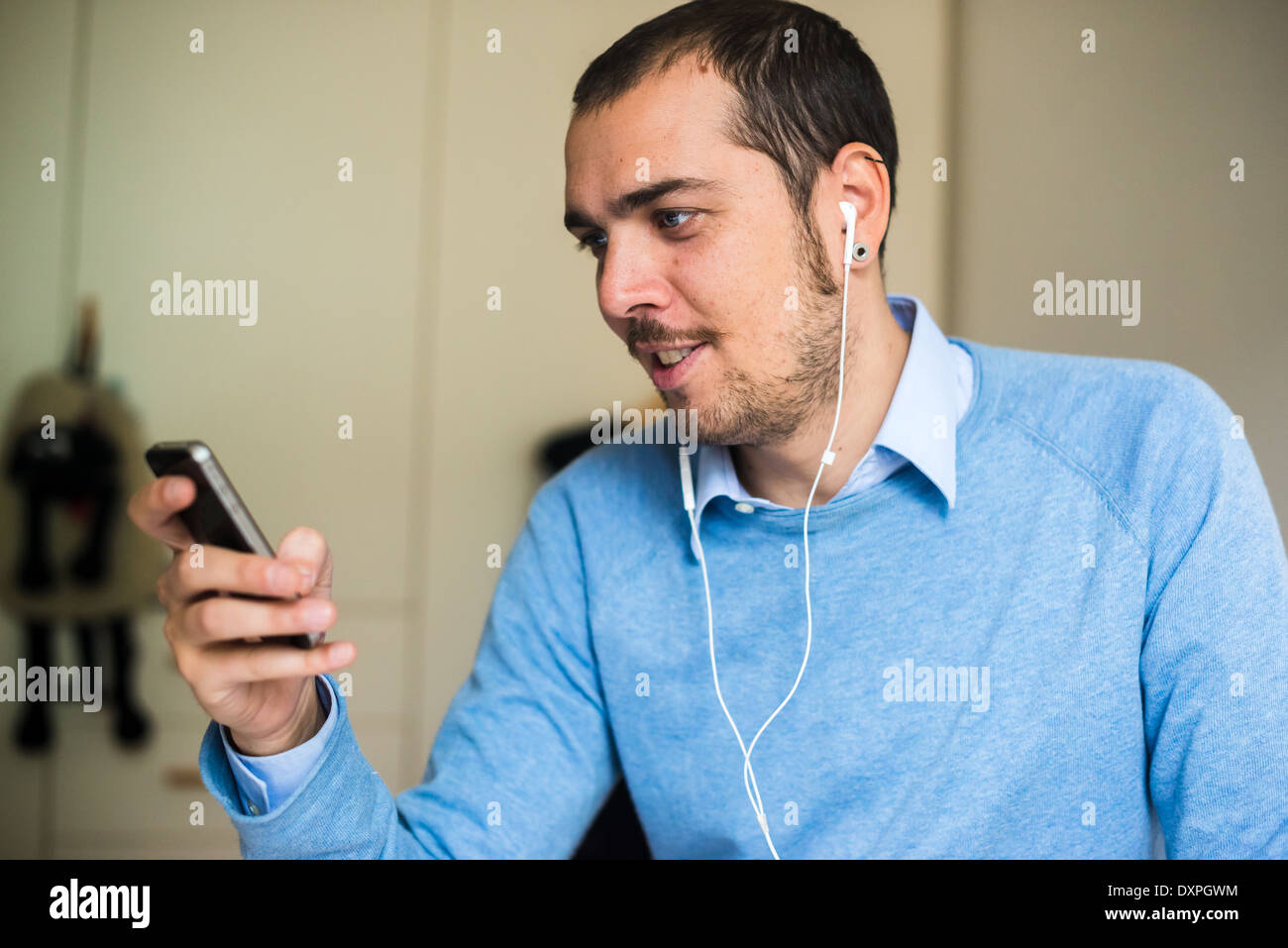 Man Using Devices Connecting to portable devices hi-res stock photography and images - Alamy