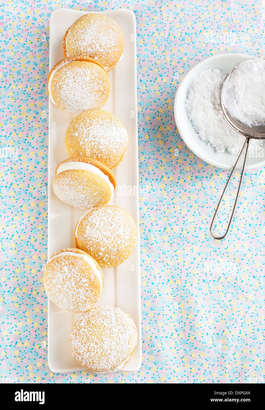 Sponge kisses with cream Stock Photo Alamy