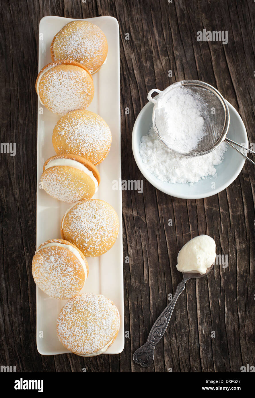 Sponge kisses with cream Stock Photo Alamy