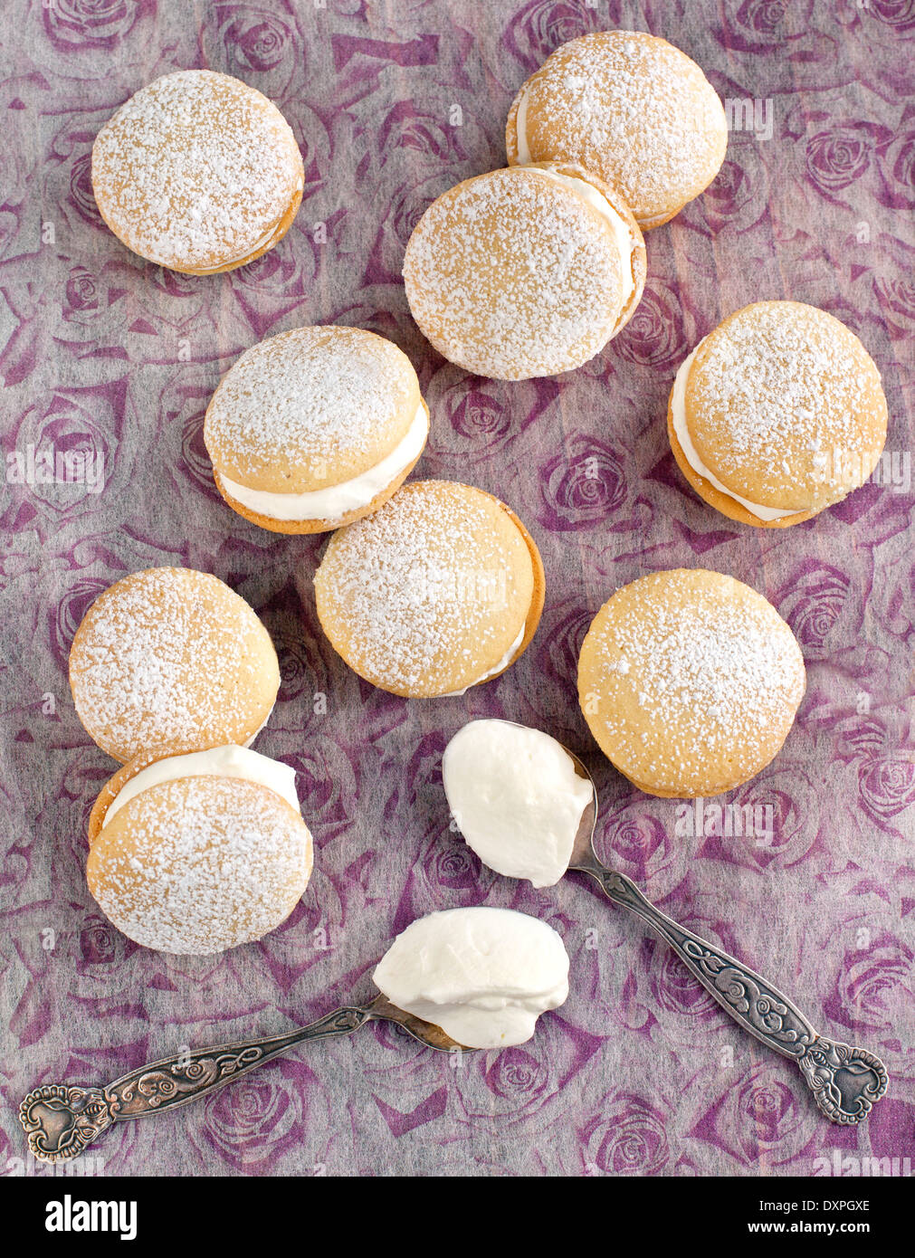 Sponge kisses with cream Stock Photo Alamy