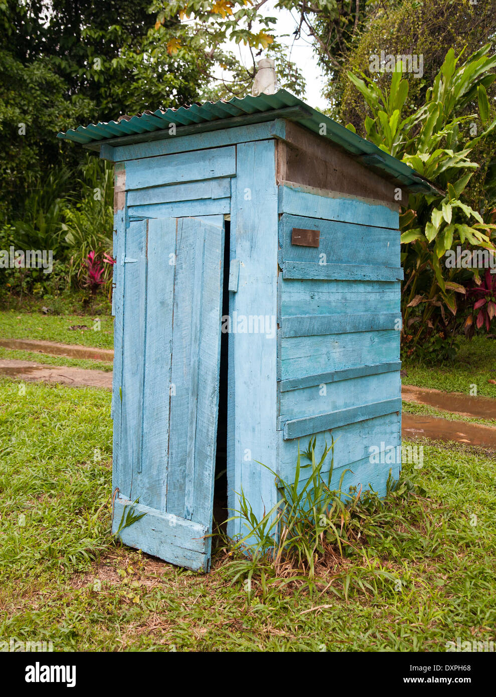 Wooden outside toilet with illfitting door Stock Photo Alamy