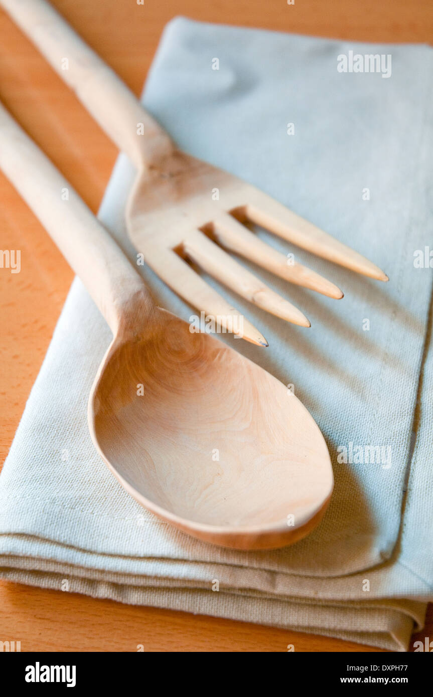 Wooden fork and spoon on napkin. Still life. Stock Photo