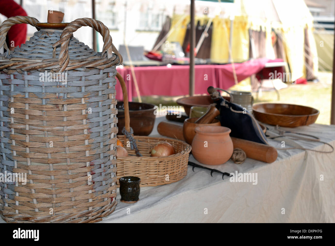 medieval cooking utensils on a table at a Medieval Festival Stock Photo