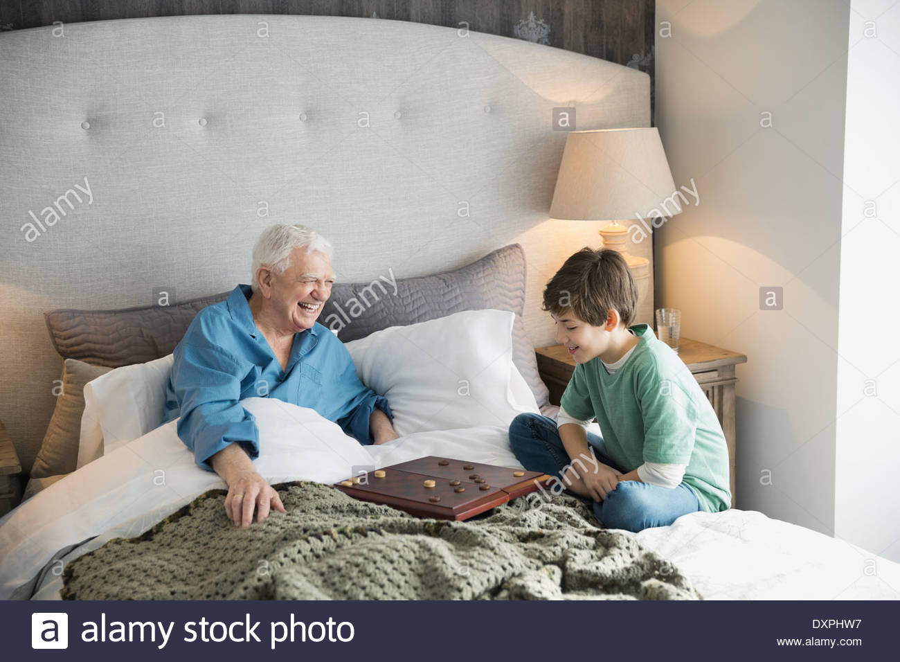 Grandfather and grandson checkers Stock Photo