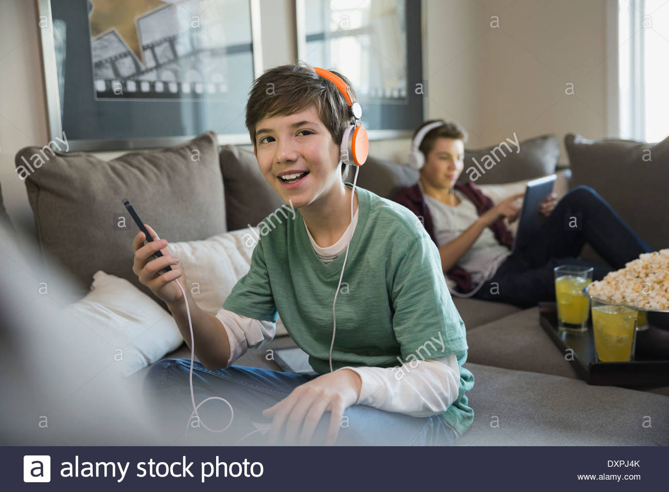 Boy listening to music on smart phone Stock Photo
