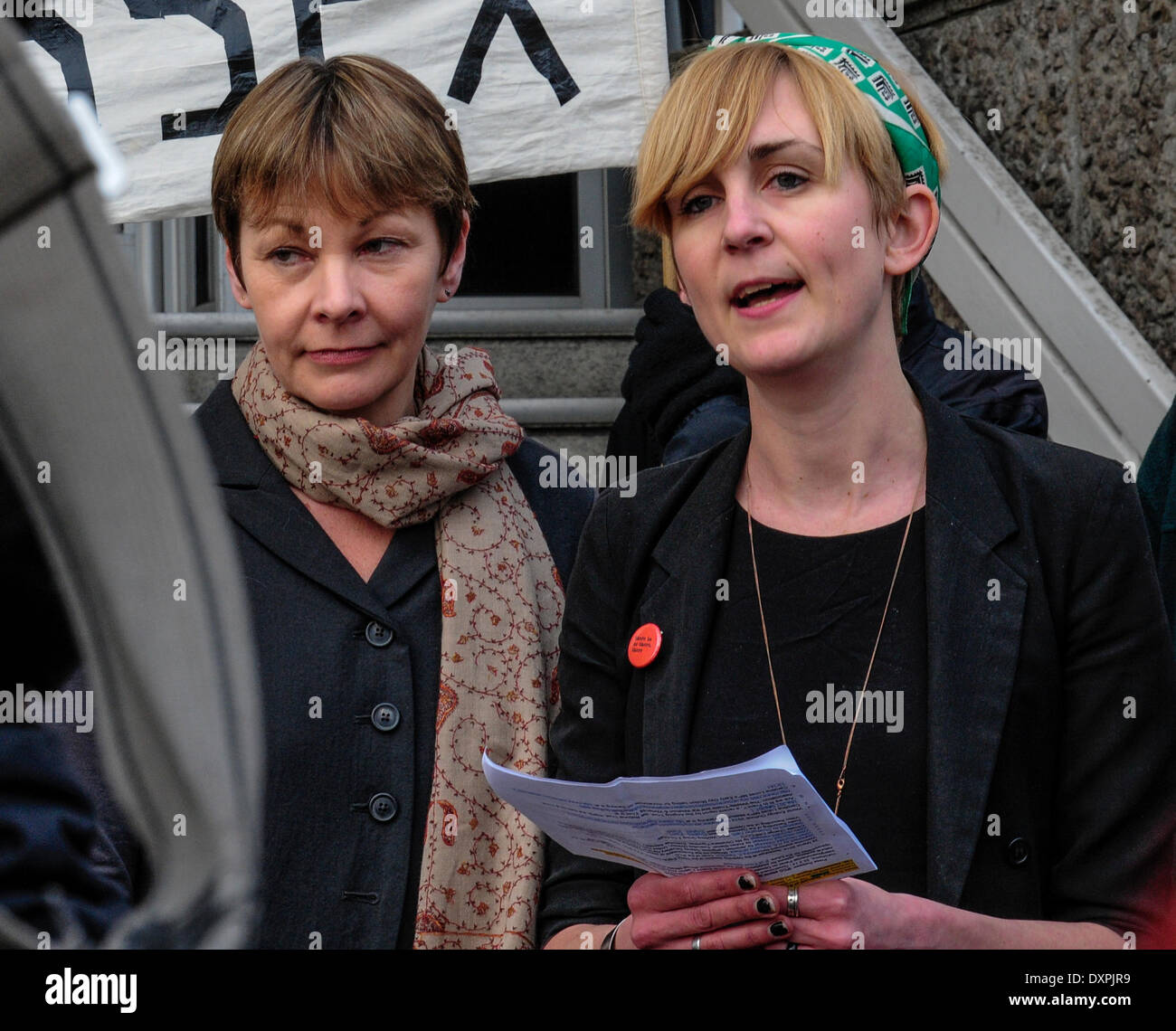 Brighton, East Sussex, UK..28 March  2014..Caroline Lucas MP outside Brighton Court  with co defendants after day 5 of their trial charged with obstructing the highway and a public order offence at Balcome where Cuadrilla was test drilling in August. The case has been adjourned to 17 April. Ms Lucas joined co defendants and supporters outside the court where Sheila Menon, also charged, read a statement  about Fracking and Ms Lucas thanked her supporters.. David Burr/Alamy Live News Stock Photo