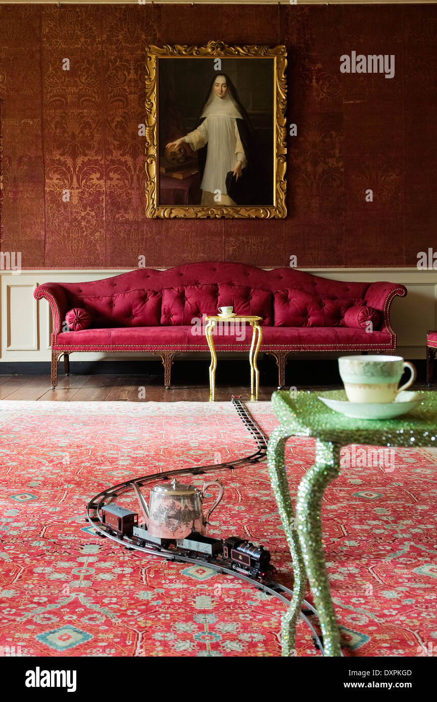 A pair of Brazier-Jones 'Beluga End Tables' linked by a toy train track in the drawing room of The Vyne Stock Photo