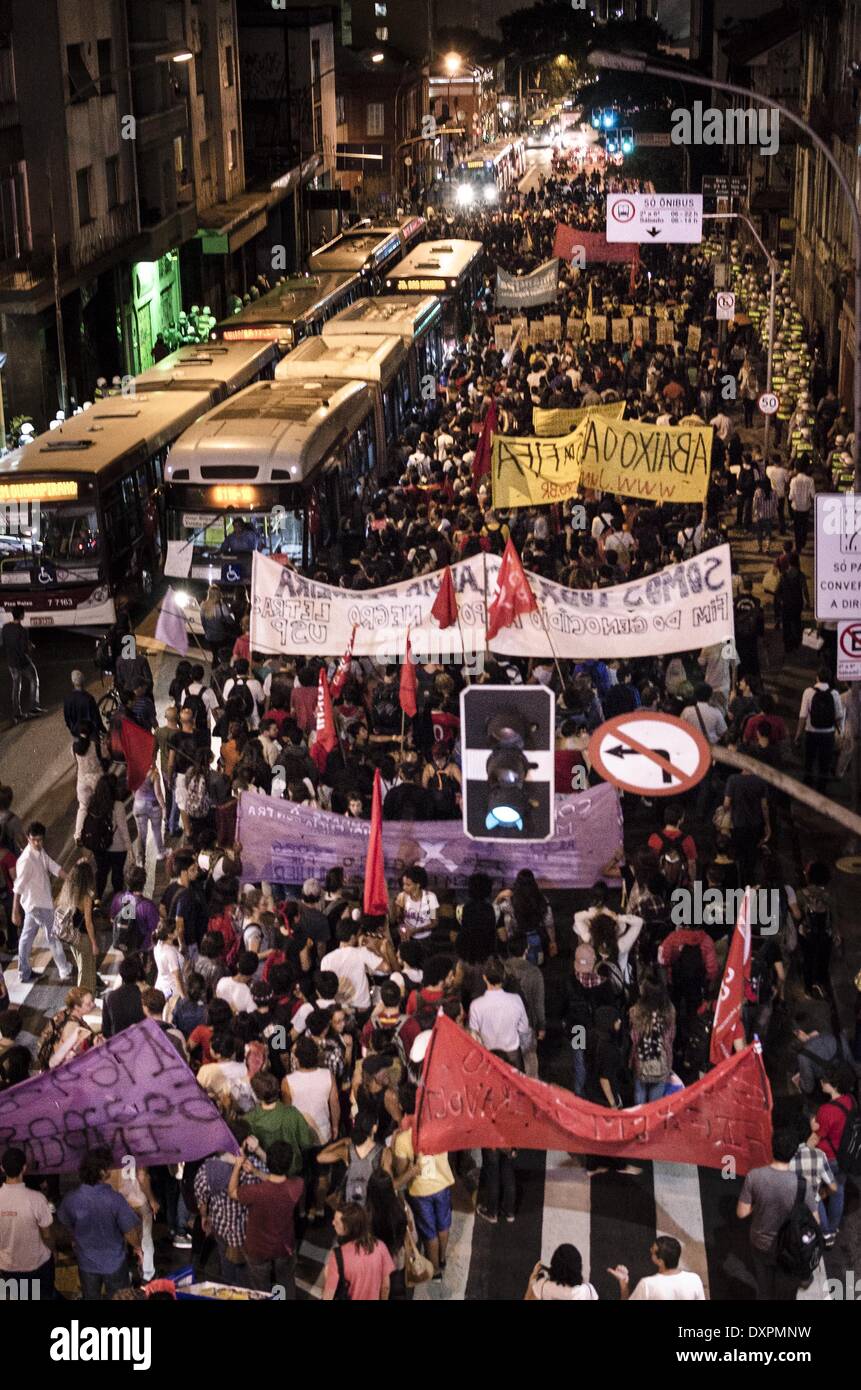 Sao Paulo, Brazil. 27th Mar, 2014. Around 1.000 people, according to police (according to organizers, around 3.000) join the 4th rally agains the World Cup, realized this thursday (27/03/2014) in Sao Paulo, Brasil. The demonstration runner without violence from either sides. This rally complained about the public transport, including feminine harassment, after a series of complains being disclosed in the last days © Gustavo Basso/NurPhoto/ZUMAPRESS.com/Alamy Live News Stock Photo