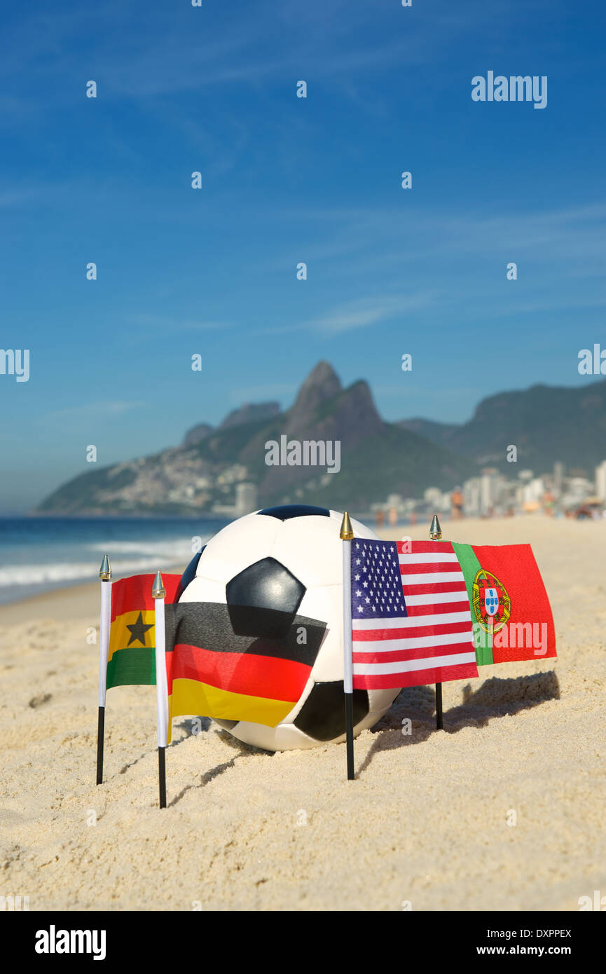 International football country Group G team flags with soccer ball on Ipanema beach in Rio de Janeiro Brazil Stock Photo