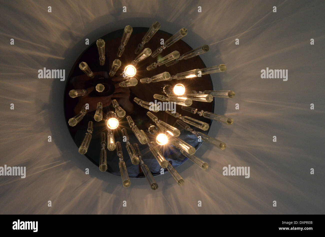 Crystal chandelier, crystal hanging rods, four halogen bulbs, throwing