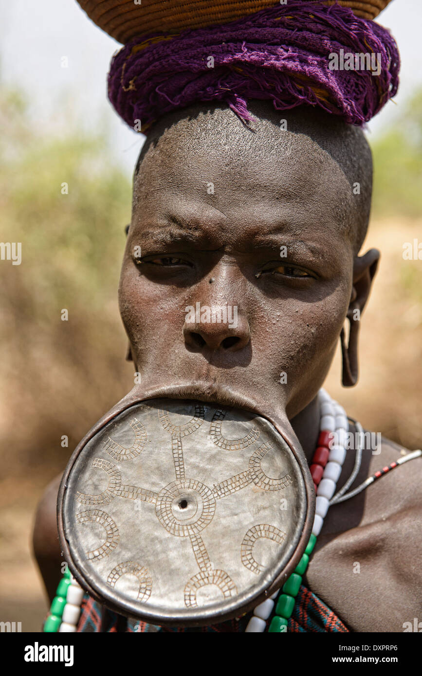 Mursi woman lip plate in hi-res stock photography and images - Alamy