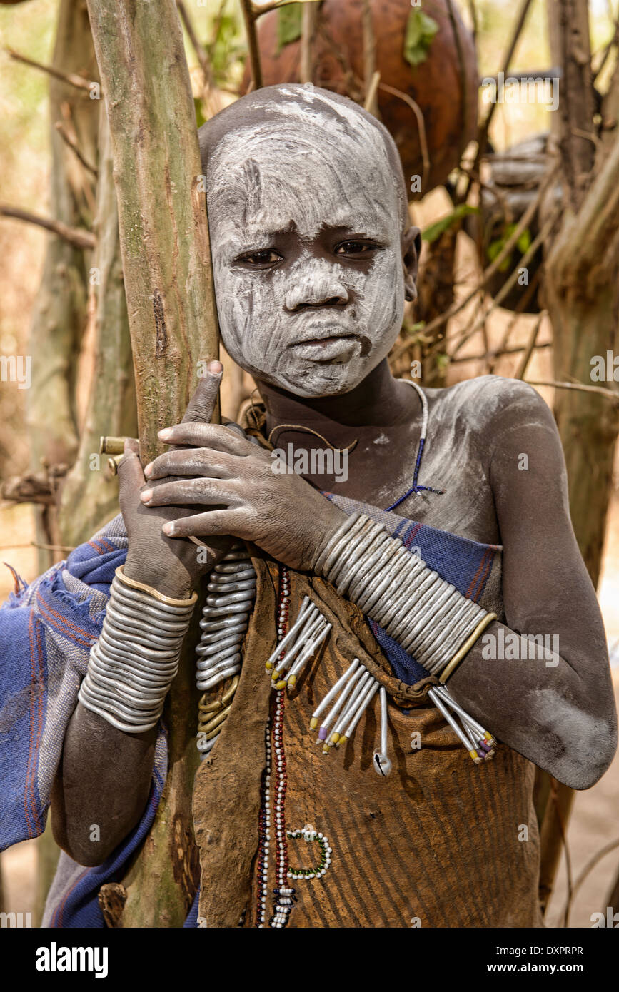 Mursi boy in the Lower Omo Valley of Ethiopia Stock Photo