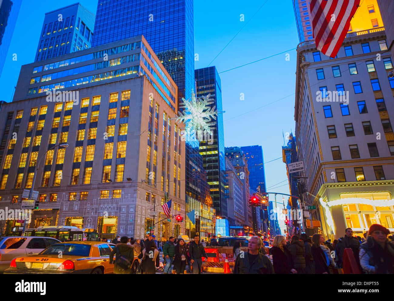 Crowded sidewalk and streets during the holiday shopping season on Fifth Avenue, New York City, NY, USA Stock Photo