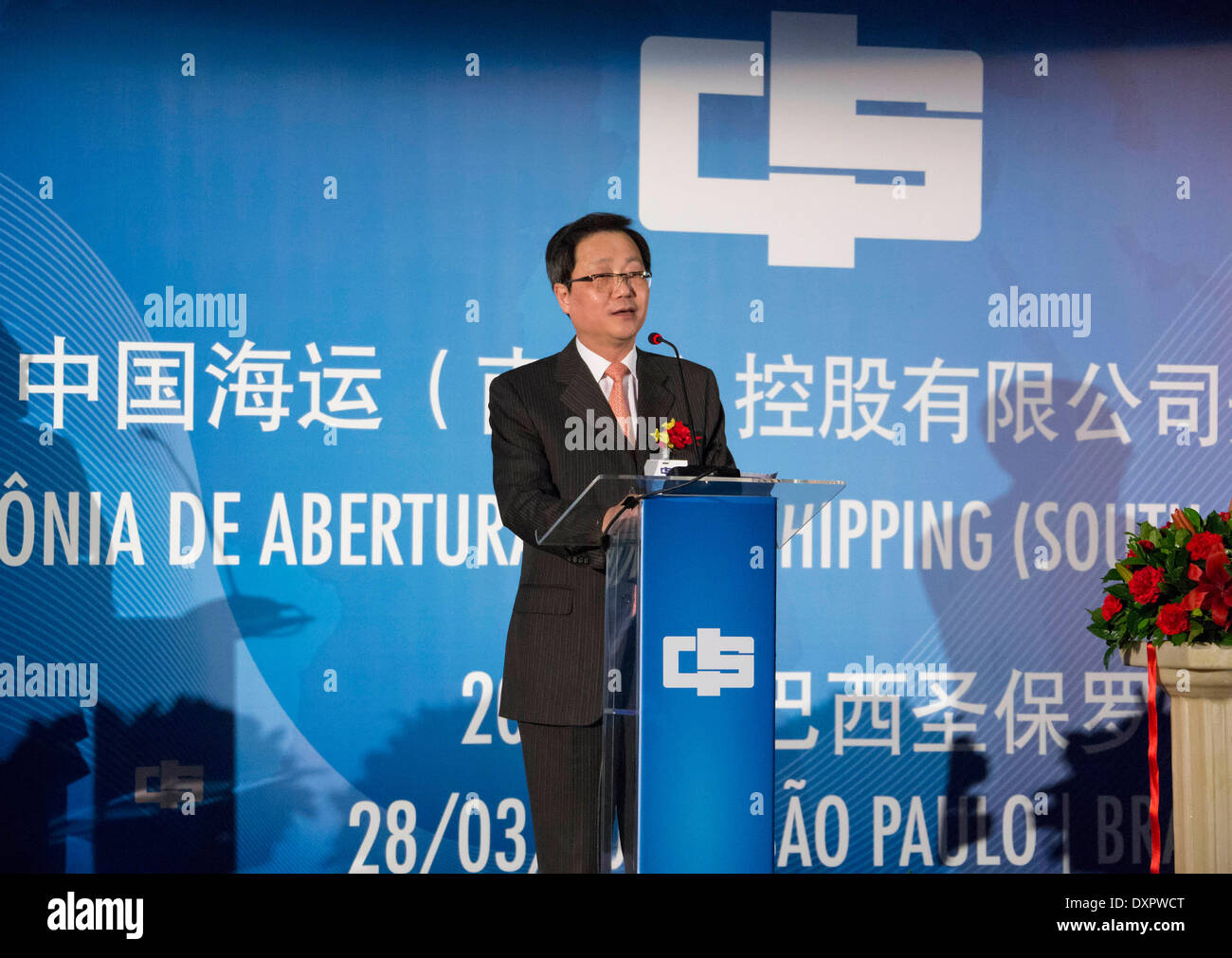 Sao Paulo, Brazil. 28th Mar, 2014. Xu Lirong, executive vice president of the China Ocean Shipping Group Company (COSCO), delivers a speech at the opening ceremony of China Ocean Shipping (South America) Holdings Co., Ltd in Sao Paulo, Brazil, March 28, 2014. The China Ocean Shipping (South America) Holdings Co., Ltd was officially established here on Friday. © Zhang Qiang/Xinhua/Alamy Live News Stock Photo