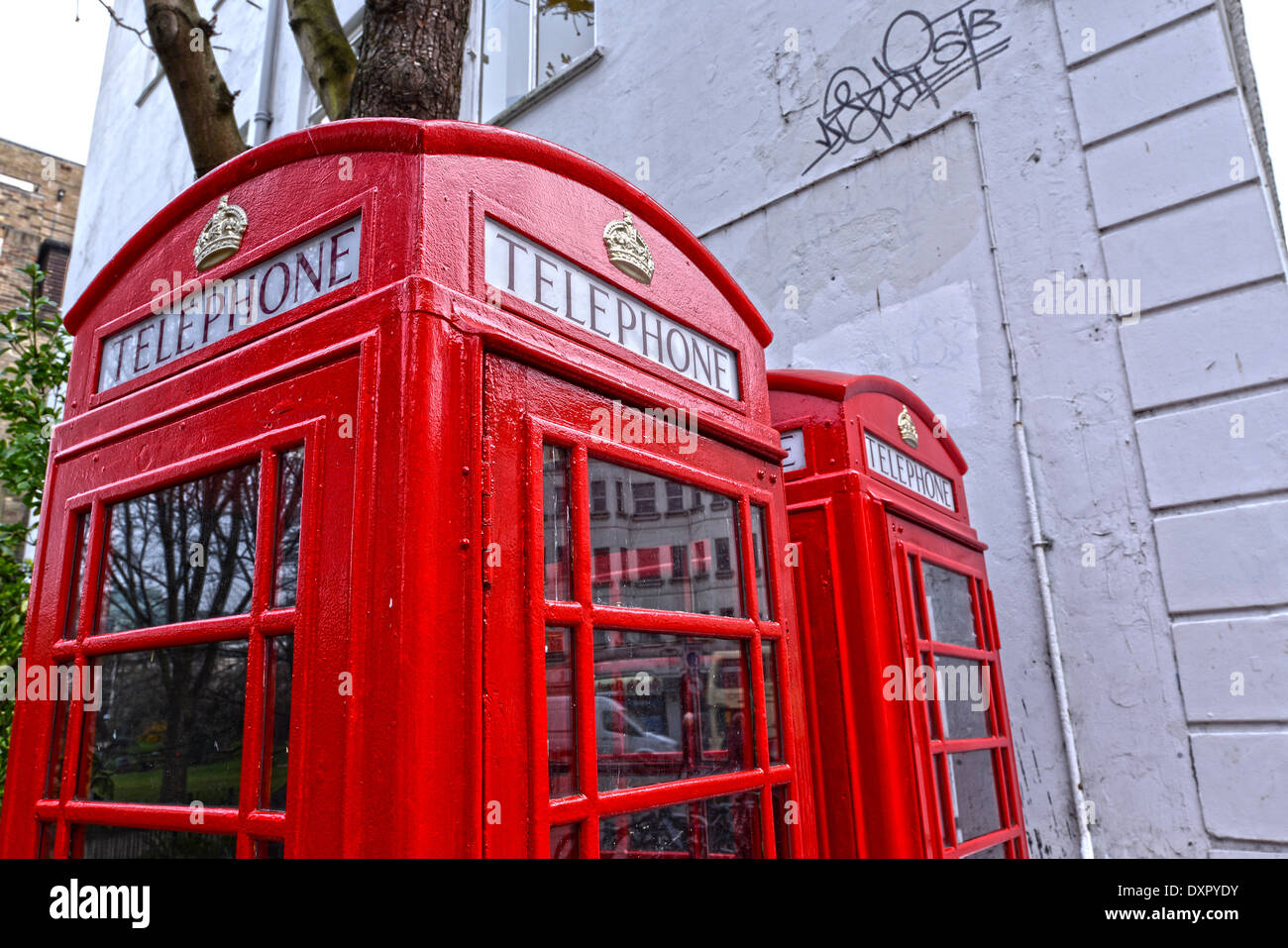 Red London public telephone boxes in Brighton city centre Stock Photo