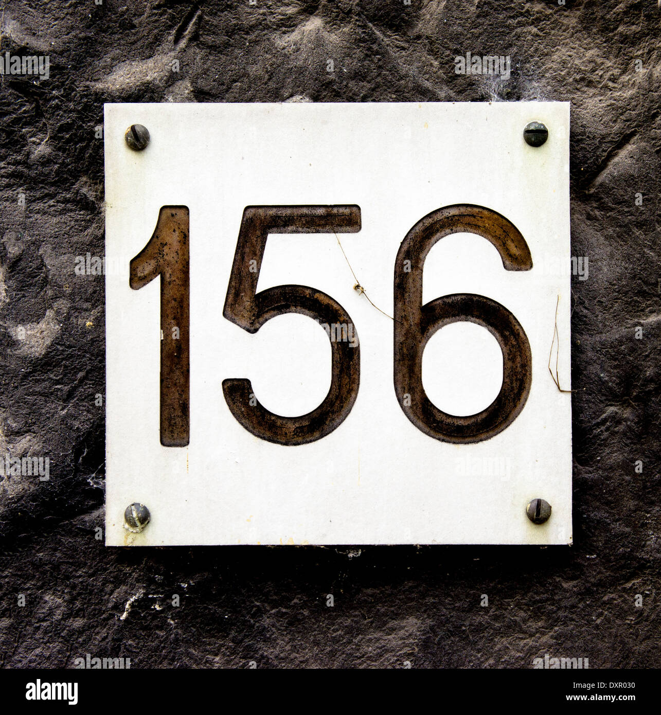 House number one hundred and fifty six. Black lettering engraved in a formica plate. Stock Photo