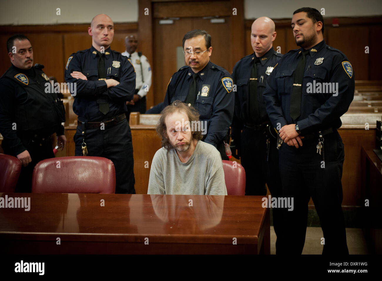 Manhattan, New York, USA. 28th Mar, 2014. Court officers look on while