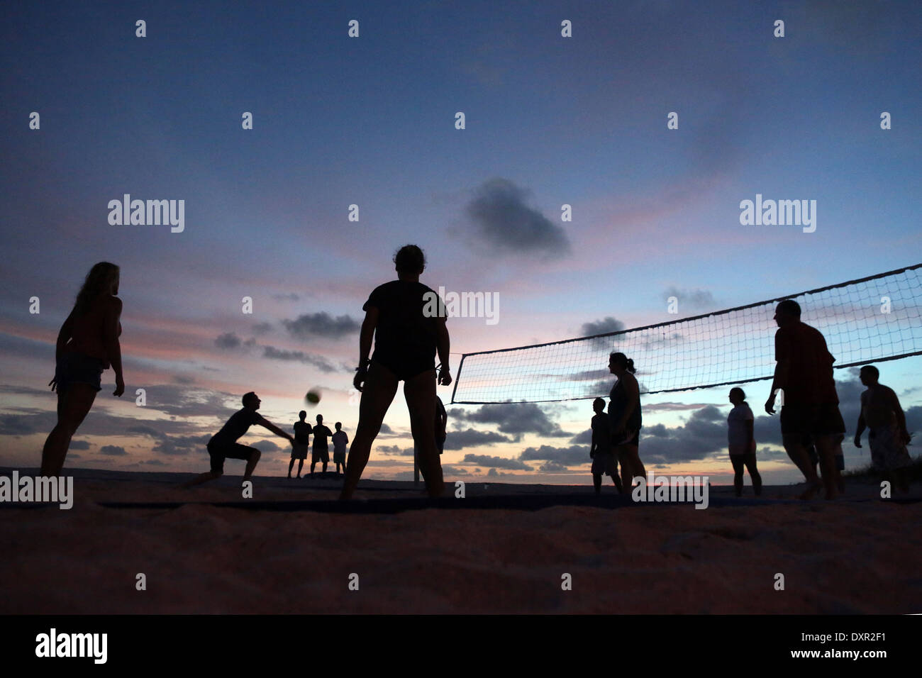 Cocoa Beach, Florida, silhouette, people playing beach volleyball in