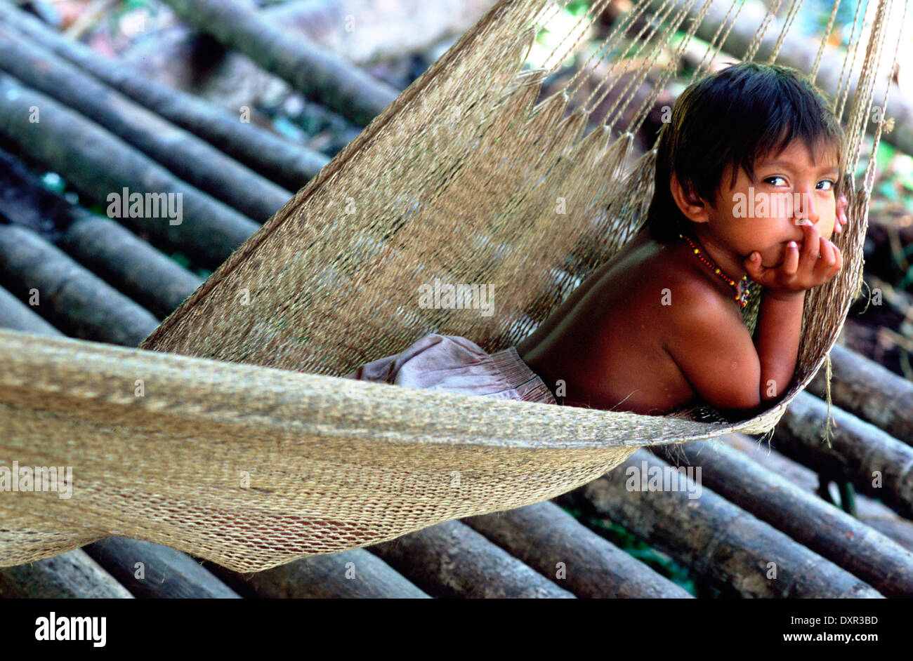 A Warao child in a hammock in the Orinoco delta. The Warao are an indigenous people inhabiting northeastern Venezuela and wester Stock Photo