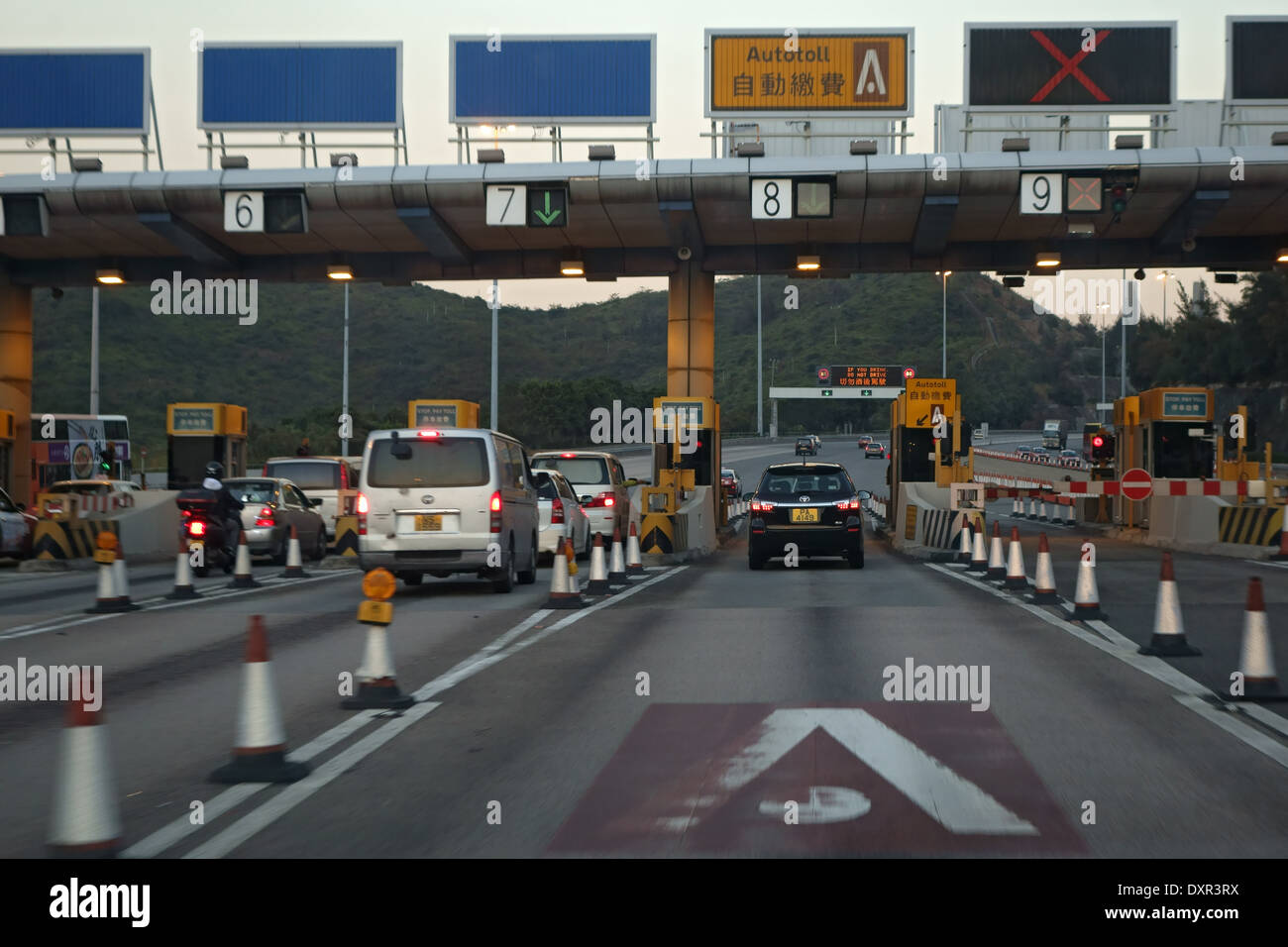 Hong Kong, China, cars at a toll booth Stock Photo