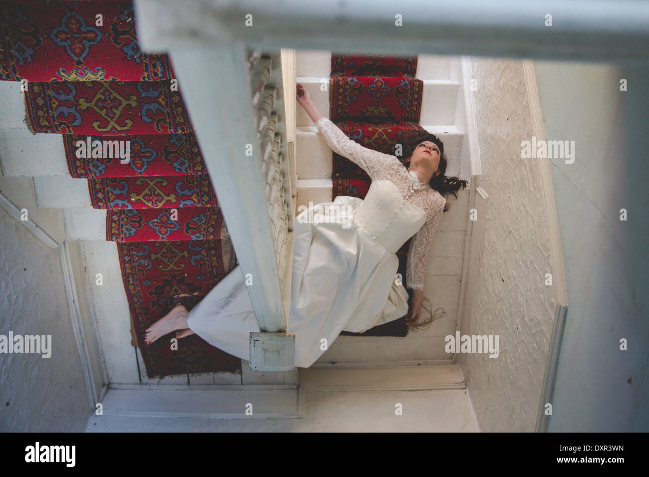Fallen Bride on the stairs Stock Photo - Alamy