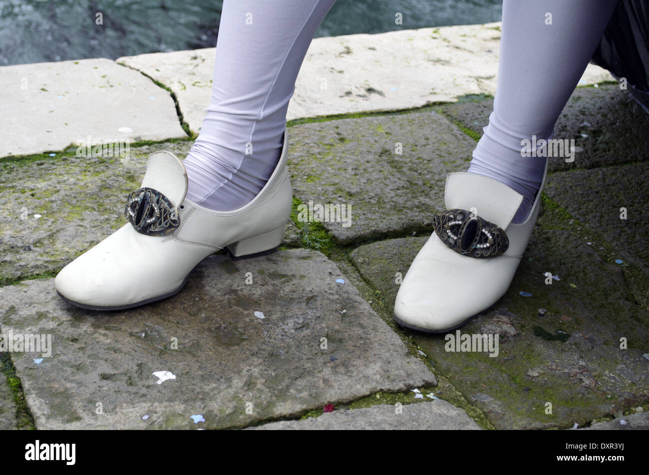 Shoes and socks at the venetian carnival in Venice Stock Photo