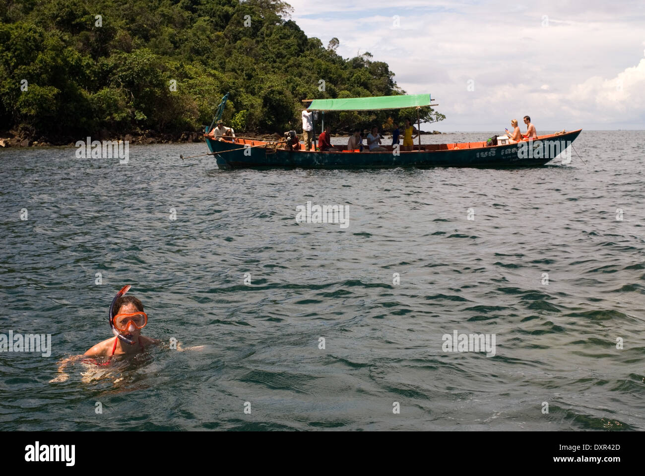 Boat for snorkeling on the island of Koh Russei. Koh Russei or Bamboo Island is one of a group of small islands in the Gulf of T Stock Photo