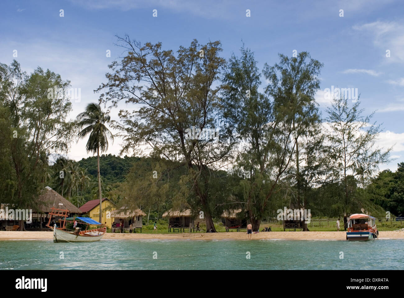 Beach on the island of Koh Russei. Koh Russei, also named Koh Russey or Bamboo Island is a green, gilt-edged crescent, resting o Stock Photo