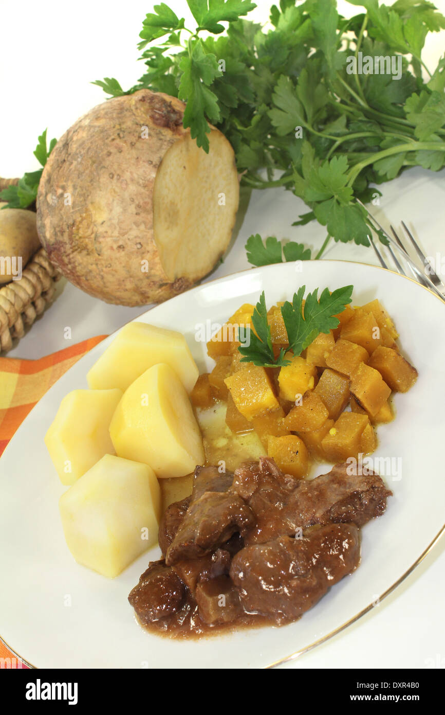 Game stew with turnips vegetables and potatoes Stock Photo Alamy