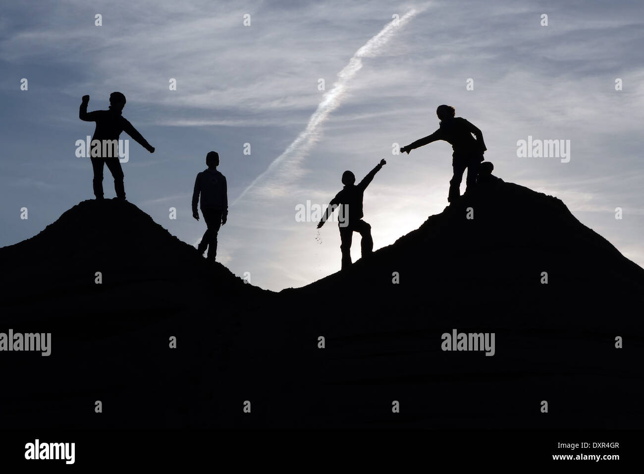 Schepsdorf, Germany, silhouette, people stand on hills of sand Stock Photo