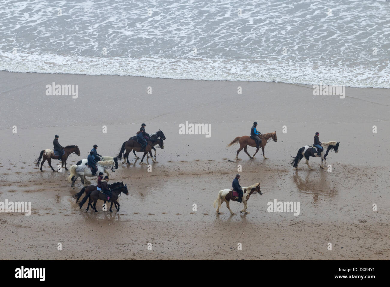 Horse riding on Saltburn beach. Saltburn by the Sea, North Yorkshire, England. UK Stock Photo