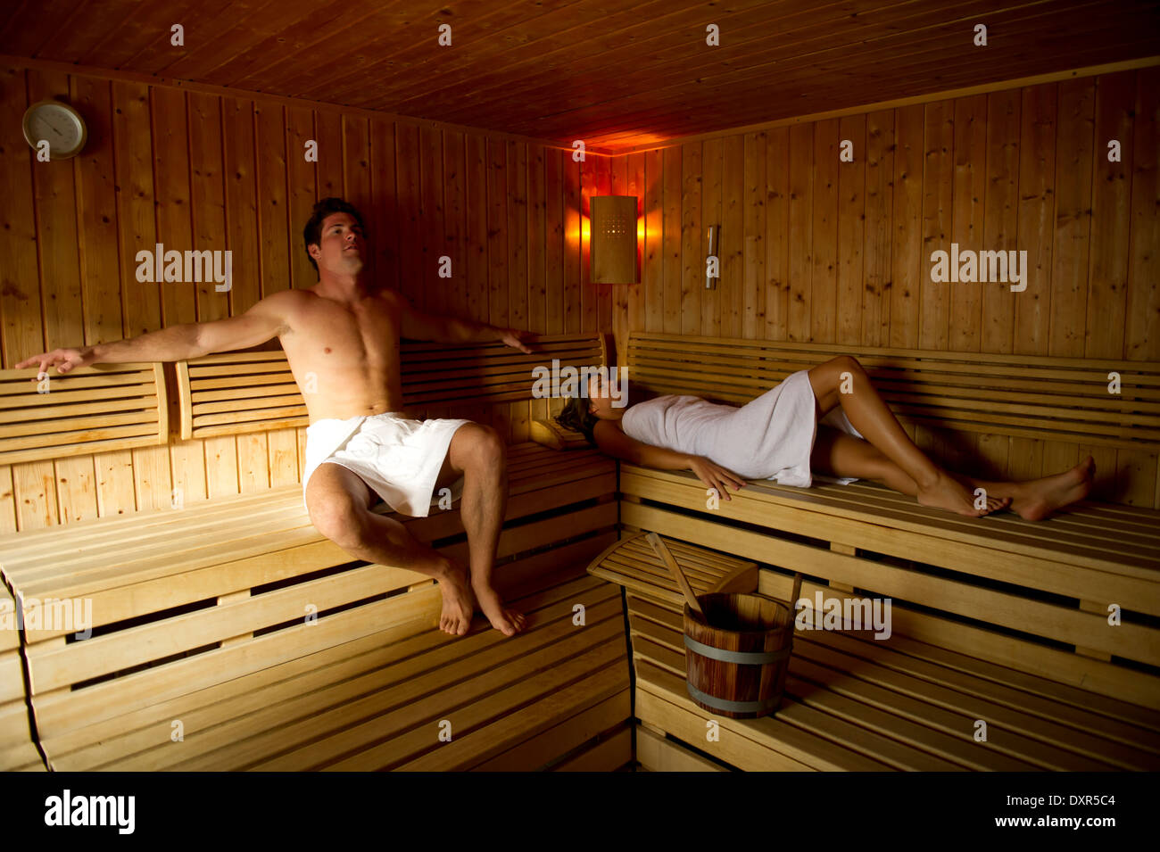 Young couple relaxing in sauna Stock Photo